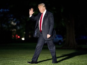President Donald Trump walks on the South Lawn as he arrives at the White House in Washington, Wednesday, May 23, 2018, returning from a roundtable discussion on illegal immigration and gang violence.