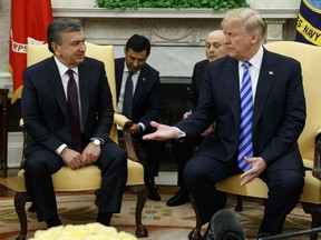 President Donald Trump meets Uzbek President Shavkat Mirziyoyev in the Oval Office of the White House, Wednesday, May 16, 2018, in Washington.