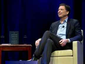 Former FBI director James Comey speaks to George Washington University students during a stop on his book tour Monday, April 30, 2018, in Washington.