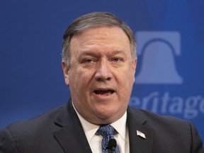 Secretary of State Mike Pompeo speaks at the Heritage Foundation, a conservative public policy think tank, in Washington, Monday, May 21, 2018. Pompeo is threatening to place "the strongest sanctions in history" on Iran if its government doesn't change course.