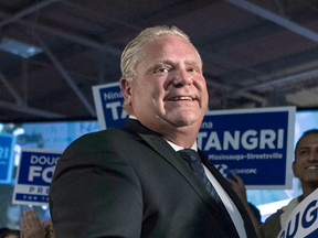 Ontario Progressive Conservative leader Doug Ford kicks off his election campaign in Toronto on May 8, 2018. Snover Dhillon, who hired himself out to clients trying to win Conservative nominations, said Monday he’s the victim of “character assassination” and challenged critics to accuse him in court if they feel he has acted improperly.
