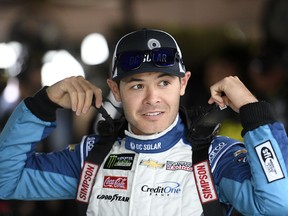 Kyle Larson gets ready for practice for the NASCAR Cup series auto race, Saturday, May 5, 2018, at Dover International Speedway in Dover, Del.
