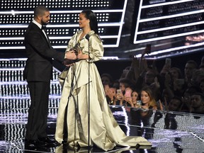 Drake presenting Rihanna with the Video Vanguard Award at the 2016 MTV Video Music Awards in 2016 and being awkward AF.