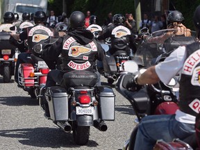 Quebec members of the Hell's Angels motorcycle gang arrive at the White Rock, B.C., chapter's property in Langley, B.C., on Friday July 25, 2008.