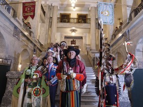 A procession makes its way through the Alberta Legislature before Alberta Premier Rachel Notley apologizes to survivors and families of the Sixties Scoop in Edmonton on Monday May 28, 2018.THE CANADIAN PRESS/Jason Franson