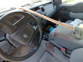 A Saskatoon man says he was cut on the forehead and sustained a concussion after an axe came flying through his truck's windshield, shown in a handout photo.