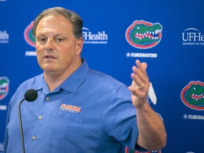 In this Feb. 13, 2017, file photo, Florida NCAA college football defensive coordinator Todd Grantham speaks during a press conference in Gainesville, Fla. Florida is spending big in an effort to get its defense back among the nation's elite. The Gators gave new defensive coordinator Todd Grantham a three-year deal worth $4.47 million, making him the highest-paid assistant in school history.