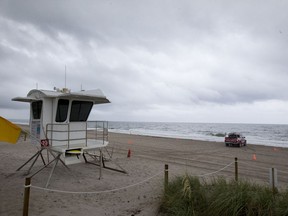 Empty beaches and low-hanging clouds are shown, Friday, May 25, 2018, at Fort Lauderdale Beach in Fort Lauderdale, Fla. A storm kicking up in the Caribbean Sea is threatening to bring heavy rainfall and flash floods to parts of Mexico, Cuba, Florida and the eastern U.S. Gulf Coast this weekend and possibly beyond.