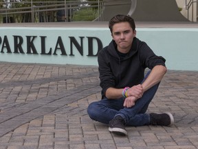 David Hogg, a senior at Marjory Stoneman Douglas High School, poses for a photo at Pine Trails Park, Tuesday, May 29, 2018, in Parkland, Fla. Hogg, one of the leaders of the March For Our Lives movement, is spearheading the national effort to register young voters along with the New York-based organization HeadCount. They say students at more than 1,000 schools in 46 states are participating, with most starting their drives Tuesday.