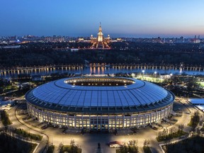 This photo taken on Monday, April 23, 2018, shows an aerial view of the World Cup Luzhniki stadium with the Moscow River and the State University in the background in Moscow, Russia. The Luzhniki stadium will hold the 2018 World Cup final.