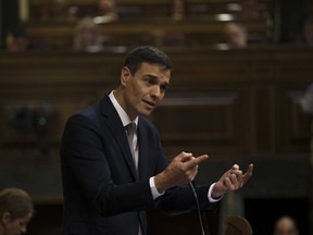 Spain's Socialist leader Pedro Sanchez addresses lawmakers during the first day of a motion of no confidence session at the Spanish parliament in Madrid, Thursday, May 31, 2018. Spain's opposition Socialists tried to persuade smaller parties to support their bid to oust Prime Minister Mariano Rajoy's conservative government as they opened a tense parliamentary debate on their no-confidence motion.