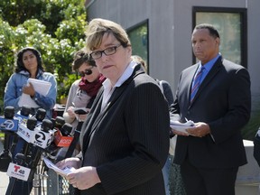 San Francisco Sheriff Vicki Hennessy makes a statement about a woman who was found dead Wednesday in a stairwell of a power plant, during a news conference outside Zuckerberg San Francisco General Hospital Thursday, May 31, 2018, in San Francisco. At right is Roland Pickens of the San Francisco Health Network. Officials say an elderly woman with dementia who was found dead in a stairwell of a power plant on a San Francisco hospital campus had checked herself out of a nearby care facility. Sheriff Hennessy said Ruby Andersen left the care facility across the street from Zuckerberg San Francisco General Hospital on May 19 to visit her family. She was not a hospital patient.