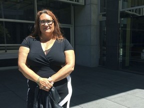 Maya Eidson, daughter of Peyton Eidson, poses outside the federal courthouse in San Francisco Friday, May 11, 2018, after her father was sentenced for drug smuggling. Peyton Eidson, a drug smuggler who prosecutors say brought thousands of pounds of marijuana into the U.S. in the 1980s before fleeing and settling in Australia was sentenced Friday to 3 years in prison. U.S. District Judge Susan Illston said her sentencing decision was "difficult," noting that Eidson was now much older and suffering from health problems. Australian officials have agreed to allow Eidson back into the country after he serves his prison term.