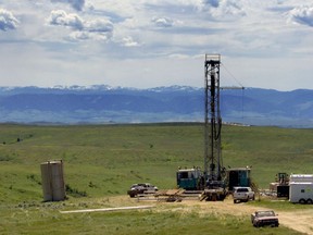 FILE - In this June 20, 2007 file photo, a natural gas drilling rig is seen outside of Wyarno, Wyo. Restrictions on drilling could be eased under a proposal from the Trump administration that would revise conservation plans for greater sage grouse, which have been in decline across much of the American West.