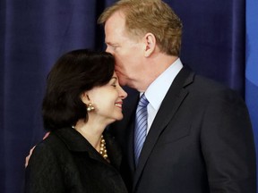 NFL commissioner Roger Goodell kisses New Orleans Saints owner Gayle Benson on the forehead before announcing New Orleans has been selected to host the 2024 Super Bowl during the NFL owner's spring meeting Wednesday, May 23, 2018, in Atlanta.