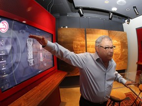 In this Thursday, May 3, 2018 photo, Atlanta Hawks CEO Steve Koonin stands in a mock up of a suite as talks about improvements the team is making to the Phillips Arena in Atlanta. Koonin says thousands have already taken the tour, promoting the arena on large video screens as an entertainment venue for basketball games, concerts and events. The tour offers a before-and-after look at the various amenities from the 360-degrees concourse, barber shop, fantasy golf area, and premium seating areas with couches and cabanas.