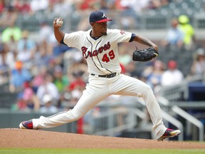 Atlanta Braves starting pitcher Julio Teheran delivers in the first inning of a baseball game against the Miami Marlins, Sunday, May 20, 2018, in Atlanta.