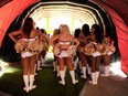 Washington Redskins cheerleaders wait in the tunnel before a game at FedEx Field in this September 2013 file photo.