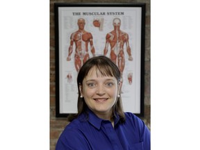 In this Saturday, May 12, 2018, photo, April Oury, owner of Body Gears physical therapy center poses for a portrait at on of her centers in Chicago. Oury started her physical therapy practice 14 years ago wanting to give all aspects of her business the same focus and attention to detail she gave patients, even when it came to choosing paint colors or an internet provider. She wouldn't do it that way again. "There was not enough time in the day or the workweek to put that kind of effort into every single thing," says Oury.