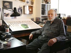 In this May 7, 2014 photo, Art Paul, the original Art Director for Playboy Magazine, poses in his home studio in Chicago. Paul, who created Playboy's famous tuxedoed bunny head logo, died of pneumonia on Saturday, April 28, 2018, at a Chicago-area hospital, according to his wife, Suzanne Seed. He was 93.
