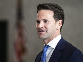 In this April 18, 2018, photo, former U.S. Rep. Aaron Schock walks out of the Dirksen Federal Building in Chicago. The 7th U.S. Circuit Court of Appeals in Chicago on Wednesday, May 30, 2018, refused to toss corruption charges against Schock, saying it can't assess whether his prosecution violated constitutional separation-of-powers clauses until after he goes to trial. The Republican from the central Illinois city of Peoria was indicted in 2016 on charges of misusing funds.