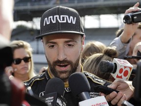 James Hinchcliffe speaks with reporters after he did not qualify for the Indianapolis 500 on Saturday.