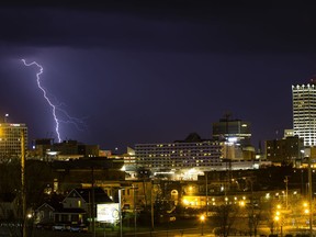 Lightning strikes southwest of downtown South Bend, Indiana Wednesday, May 2, 2018 as scattered thunderstorms rolled through the area.