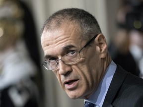 Carlo Cottarelli, Italy's premier-designate attends a news conference at the Quirinale Palace in Rome, Italy, on Monday, May 28, 2018.