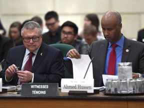 Minister of Public Safety and Emergency Preparedness Ralph Goodale and Minister of Immigration, Refugees and Citizenship Ahmed Hussen prepare to appear before the Standing Committee on Citizenship and Immigration on Parliament Hill in Ottawa on Tuesday, May 29, 2018.