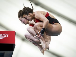 Canada's Meaghan Benfeito, right, and Caeli McKay, compete during the women's 10-metre open synchro event at the Canada Cup FINA Diving Grand Prix in Calgary, Alta., Saturday, May 12, 2018.