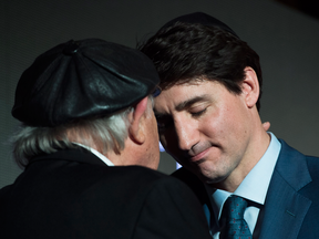 Prime Minister Justin Trudeau with Holocaust survivor Nate Leipciger after speaking at the March of Living gala in Toronto on May 8, 2018.