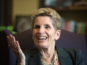Ontario Premier Kathleen Wynne, seen in an interview on April 12, 2018, has dismissed a damning report from the province's auditor general as an accounting dispute.