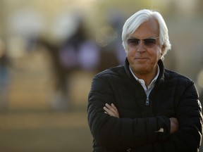 Trainer Bob Baffert watches a morning workout at Churchill Downs Tuesday, May 1, 2018, in Louisville, Ky. The 144th running of the Kentucky Derby is scheduled for Saturday, May 5.