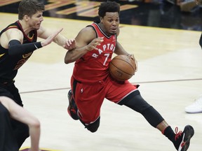 Toronto Raptors' Kyle Lowry (7) drives past Cleveland Cavaliers' Kyle Korver during the second half of Game 3 of an NBA basketball second-round playoff series Saturday, May 5, 2018, in Cleveland.