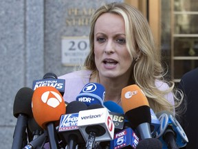 FILE - In this April 16, 2018, file photo, adult film actress Stormy Daniels speaks outside federal court, in New York. The mayor and members of the City Council in West Hollywood, Calif., will give the porn actress the Key to the City in a ceremony Wednesday, May 23, 2018, at the adult boutique Chi Chi LaRue's.