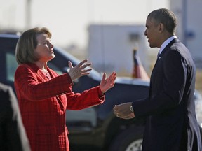 FILE - In this Nov. 25, 2013 file photo, President Barack Obama and Sen. Dianne Feinstein, D-Calif., greet each other on the tarmac upon his arrival on Air Force One at San Francisco International Airport.  Obama is backing Feinstein for re-election as she faces a challenge from within the Democratic party. The California senator released a statement from Obama Friday, May 4, 2018, calling Feinstein one of the "most effective champions for progress." She's facing a challenge from state Sen. Kevin de Leon.