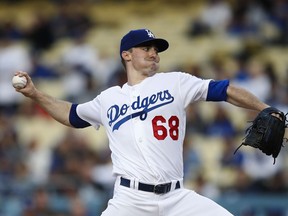 Los Angeles Dodgers starting pitcher Ross Stripling throws to a Philadelphia Phillies batter during the first inning of a baseball game Wednesday, May 30, 2018, in Los Angeles.