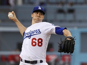 Los Angeles Dodgers pitcher Ross Stripling throws during the first inning of a baseball game against the Cincinnati Reds on Saturday, May 12, 2018, in Los Angeles.