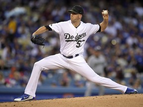 Los Angeles Dodgers starting pitcher Alex Wood throws during the third inning of the team's baseball game against the San Diego Padres on Saturday, May 26, 2018, in Los Angeles.