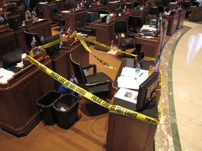 Lawmakers in the House roped off the area around Rep. Stuart Bishop's desk, on Wednesday, May 16, 2018, in Baton Rouge, La. The police tape was a joke after Bishop, R-Lafayette, got into a bar fight with Sen. Norby Chabert, a Houma Republican, a night earlier. Both say they regret the fight and consider themselves friends.