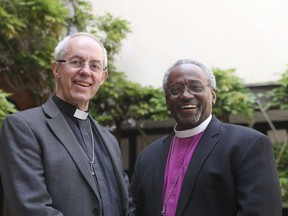 The Archbishop of Canterbury Justin Welby, left, and American bishop Michael Curry pose for the media ahead of the wedding of Prince Harry and Meghan Markle on Saturday at St George's Chapel, Windsor, England, Friday, May 18, 2018.