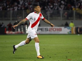 FILE - In this Tuesday, Oct. 10, 2017 filer, Peru's Paolo Guerrero celebrates after scoring against Colombia during a 2018 World Cup qualifying soccer match in Lima, Peru. Peru captain Paolo Guerrero has been banned from playing at the World Cup because of a positive doping test, it was announced on Monday, May 14, 2018. The Court of Arbitration for Sport says it has upheld an appeal by the World Anti-Doping Agency to extend Guerrero's six-month FIFA ban.