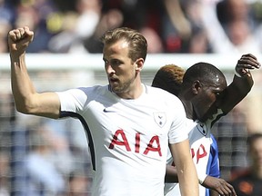 Tottenham Hotspur's Harry Kane celebrates scoring his side's first goal of the game during the English Premier League soccer match between Tottenham Hotspur and Leicester City, at Wembley Stadium, in London, Sunday May 13, 2018.