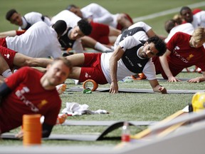 Liverpool's Mohamed Salah, centre, trains with teammates, at Anfield, in Liverpool, England, Monday May 21, 2018 ahead of the Champions League final between Liverpool and Real Madrid in Kiev on Saturday.