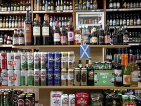 Shelves of alcoholic drinks are displayed for sale in an Edinburgh off-licence as Scotland has become the first country in the world to introduce minimum unit pricing for drinks, in Edinburgh, Scotland, Tuesday May 1, 2018. Health campaigners welcomed the change, saying minimum pricing for alcohol will save lives and money.