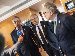 From left, Peter Montopoli, Secretary-General of the Football Association of Canada, Carlos Cordeiro, President of the United States Football Association and Decio de Maria, President of the Football Association of Mexico talk to the media after a meeting with Various Soccer Unions to present their bid to host the Soccer World Cup 2026, in Copenhagen, Thursday May 3,  2018.