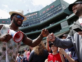 Boston Red Sox's Hanley Ramirez greets fans before a baseball game against the Baltimore Orioles in Boston, Sunday, May 20, 2018.