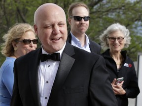 Former New Orleans Mayor Mitch Landrieu, front, arrives at the John F. Kennedy Presidential Library and Museum before 2018 Profile in Courage award ceremonies, Sunday, May 20, 2018, in Boston. Landrieu is scheduled to be presented with the award during ceremonies Sunday.