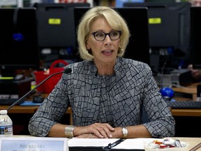Education Secretary Betsy DeVos speaks during a visit of the Federal School Safety Commission at Hebron Harman Elementary School in Hanover, Md., Thursday, May 31, 2018. DeVos listened to first-graders share stories about friendship during a field trip by a presidential commission seeking ways to stem a steady stream of school violence. The school specializes in mentoring and counseling as opposed to punitive discipline.