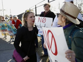 In this April 18, 2018 photo, Chelsea Manning speaks with protesters at an anti-fracking rally in Baltimore. It's one of the most unconventional U.S. Senate bids in recent memory: Manning, America's most famous convicted leaker, is seeking to win Maryland's Democratic primary.